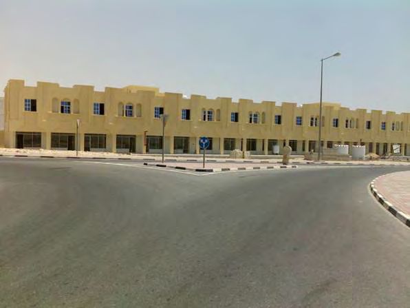 Commercial row with shops at ground level