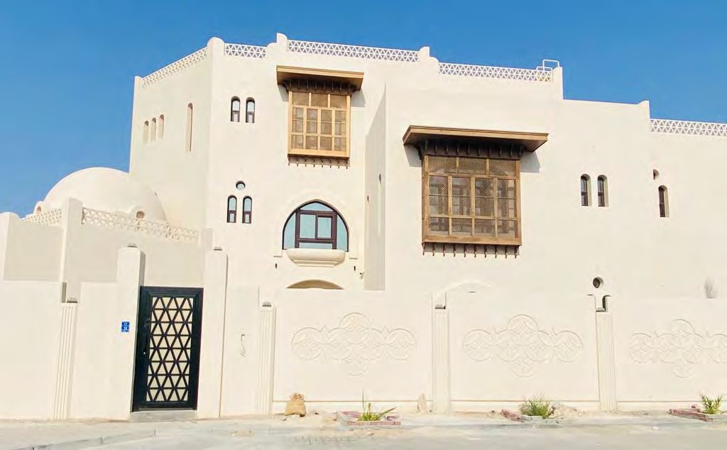 Private villa with traditional mashrabiya windows